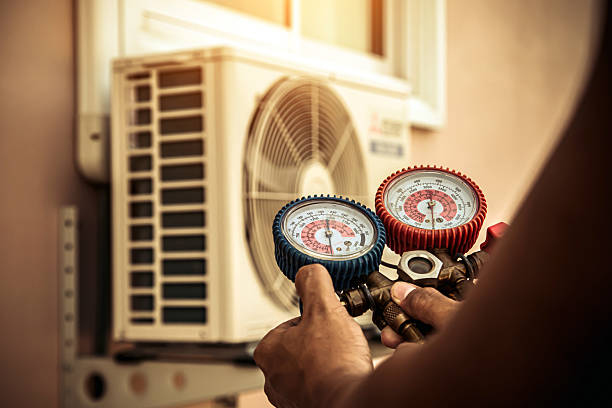 Professional Hvac technician working in Greenford, OH